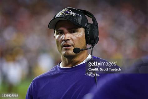 Defensive coordinator Mike Macdonald of the Baltimore Ravens looks on ...