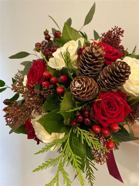 Christmas Wedding | Bridal bouquet, Contemporary flower arrangements ...