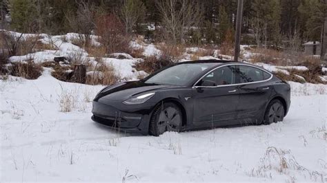 Tesla Model 3 AWD Versus Deep Snow: Video