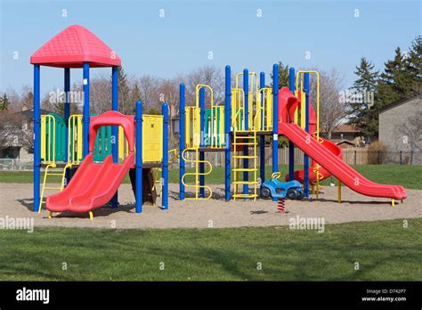 Playground slides hi-res stock photography and images - Alamy