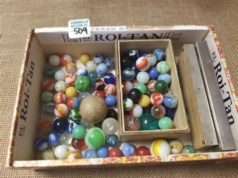 CIGAR BOX OF MARBLES AND SMALL GAMES | Live and Online Auctions on HiBid.com