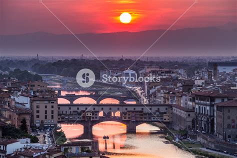 Sunset view of bridge Ponte Vecchio. Florence, Italy Royalty-Free Stock Image - Storyblocks