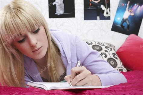 Girl writing diary — Stock Photo © londondeposit #33891039