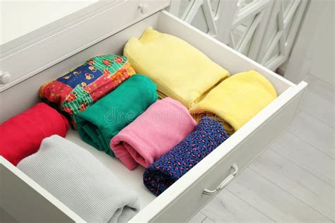 Folded Clothes in Drawer. Apparel Storage Stock Photo - Image of casual ...