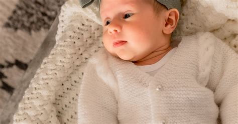 A Newborn Baby in a Basket · Free Stock Photo