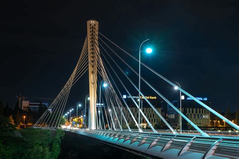 Illuminated contemporary bridge at night city · Free Stock Photo