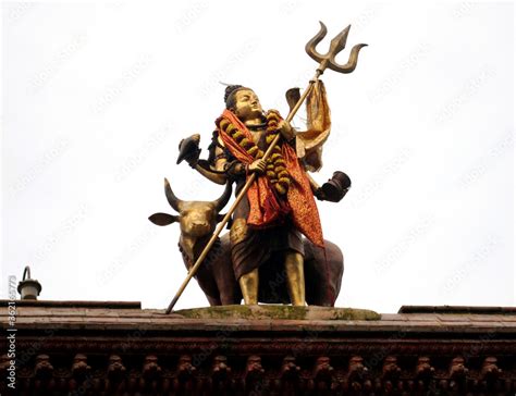 The golden statue of Lord Shiva stands tall at Pashupatinath Temple in ...