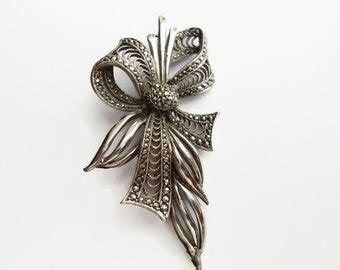 Popular items for marcasite bow brooch on Etsy