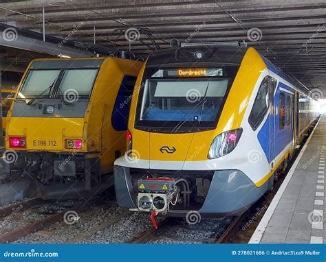 Traxx Locomotive and SNG Train at the Hague Central Station Editorial ...