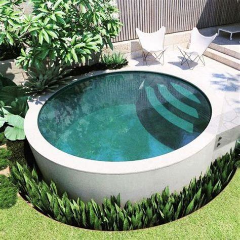 33 Lovely Swimming Pool Garden Ideas To Get Natural Accent - PIMPHOMEE ...