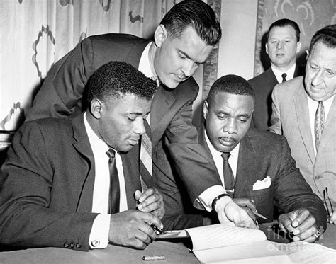 Floyd Patterson and Sonny Liston sign the contract for the next World ...