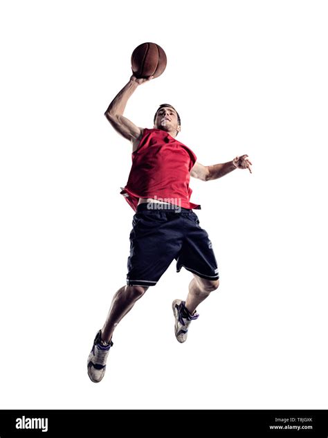 Basketball player in action isolated on white background Stock Photo - Alamy