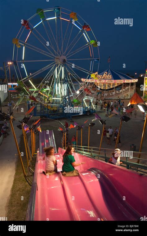 Children taking rides at Carolina Beach Boardwalk Amusement Park, North ...