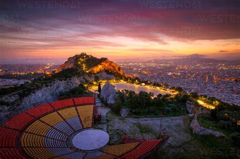 View of Lycabettus hill and Athens at sunset, Greece. stock photo