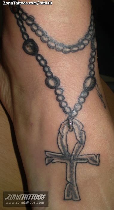 Tattoo of Rosaries, Crosses, Ankh