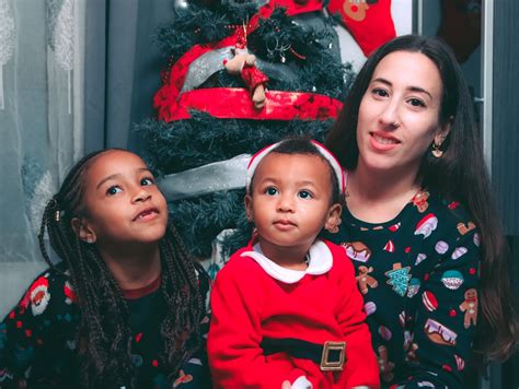 A Family Wearing Christmas Sweaters · Free Stock Photo