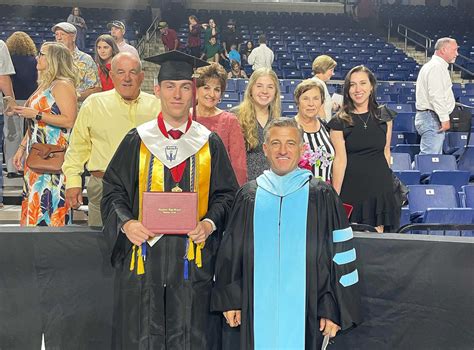 Huffman superintendent awards diploma to his son