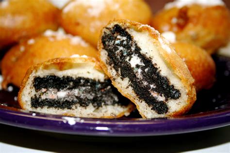 Deep Fried Oreos: Dip Oreos in pancake batter, fry them in oil, dust them with powdered sugar ...