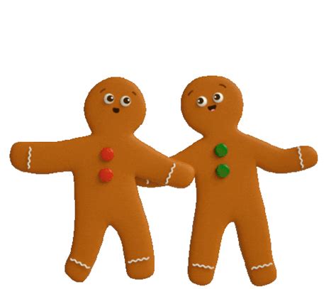 two gingerbread men standing next to each other