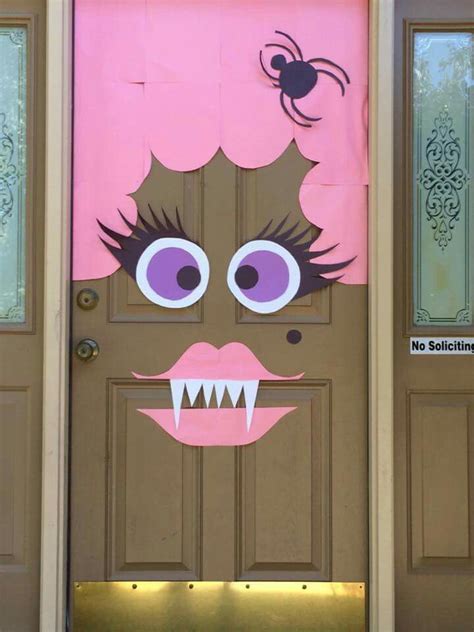 Halloween monster door | Monster door decoration, Halloween monster doors, Halloween door