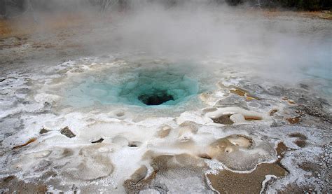 Hot springs and Geysers in Yellowstone Photograph by Pierre Leclerc ...