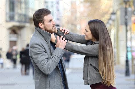 Angry Couple Fighting in the Street