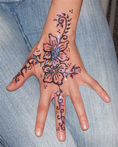 Flower Henna Designs | Henna flower designs, Henna tattoo designs, Henna tattoo hand