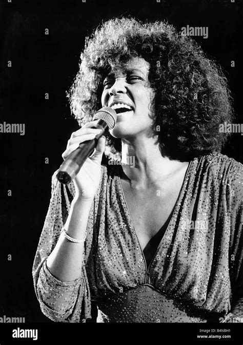 Whitney Houston performing at a concert October 1987 Stock Photo - Alamy