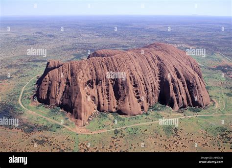 Australia, Northern Territory, Ayers Rock the monolith of Uluru National Park (aerial view Stock ...