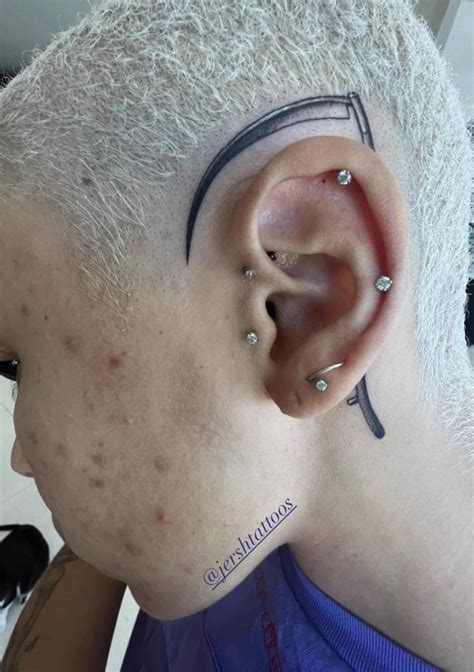 Doja Cat Got A Massive Scythe Tattoo Over Her Ear, And It's Very Impressive