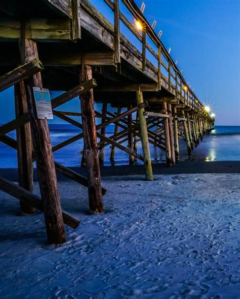 Sunset Beach fishing Pier editorial stock image. Image of fish - 57967534