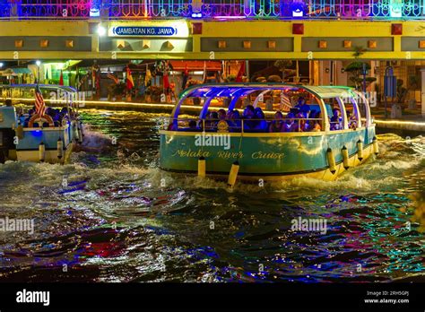 Malacca River Cruise boat sailing down the Malacca river at night Stock ...