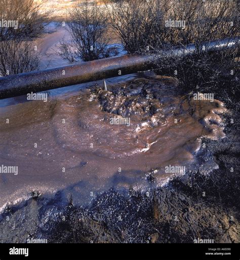 Oil pipeline springs a leak Stock Photo - Alamy