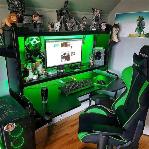 a gaming room with green and black furniture, including a computer ...