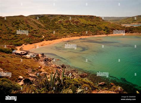 The "golden sandy" beach of "Ghajn Tuffieha Bay" in northwest Malta Stock Photo - Alamy