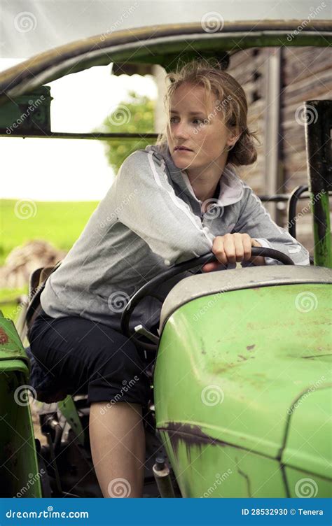 Woman Driving A Tractor Stock Photo - Image: 28532930