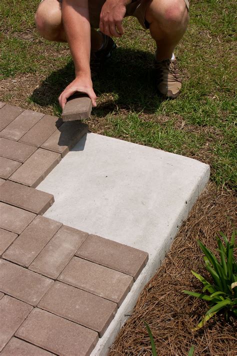 brick veneer for steps - Google Search | Concrete patio, Pavers over concrete, Small front yard ...