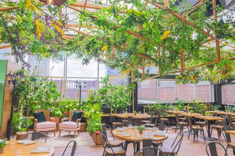 Eataly's Flatiron Rooftop Reopens As A Stunning Blooming Greenhouse