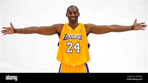 Los Angeles Lakers' Kobe Bryant shows his wingspan as he poses a ...