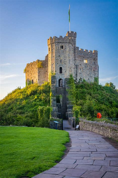 Brown Brick Castle Near Green Grass Field · Free Stock Photo