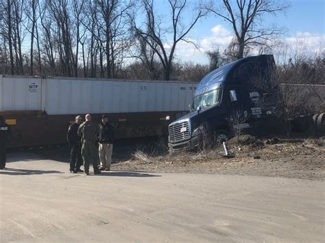 Train collides with tractor-trailer in Rosedale