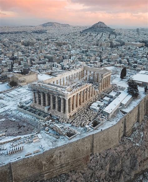 Snowy Athens, the Acropolis and Mount Lycabettus. Photo by stelecopter on Instagram Greece ...