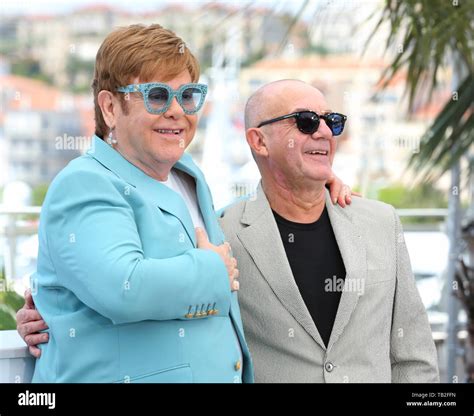 CANNES, FRANCE - MAY 16: Elton John and Bernie Taupin attend the 'Rocketman' photocall during ...