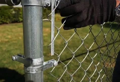 Attach the tension bar posts - Install Chain Link Fence | Chain link fence installation, Chain ...