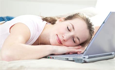 Woman Fell Asleep On Her Laptop Stock Photo - Image: 46666011