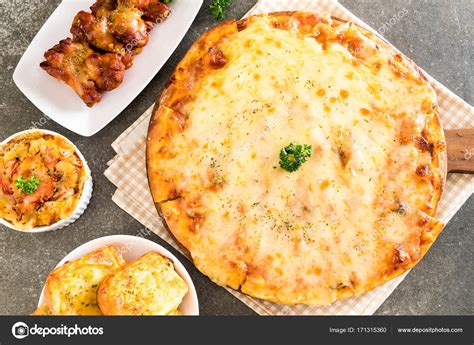 Four cheese pizza Stock Photo by ©topntp 171315360