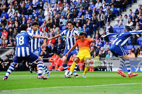 Alexis Sanchez of FC Barcelona scores the opening goal among RCD Espanyol players during the La ...