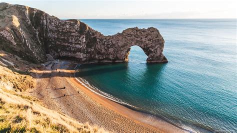 Durdle Door in photos - natural sea arch in England, UK