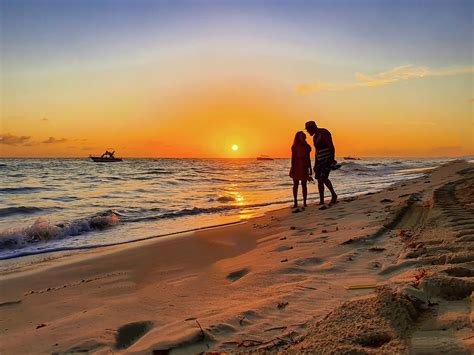 Couple in the sunset on Caribbean beach Photograph by Valentina Sandu ...