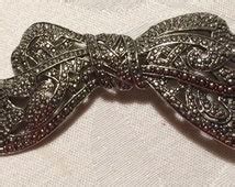 Popular items for marcasite bow brooch on Etsy